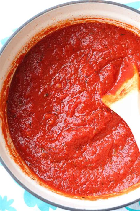 rich-and-zesty-pizza-sauce-claudias-table image