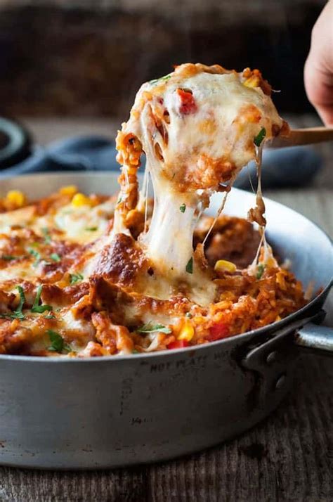 one-pot-chicken-enchilada-rice-casserole-recipetin-eats image