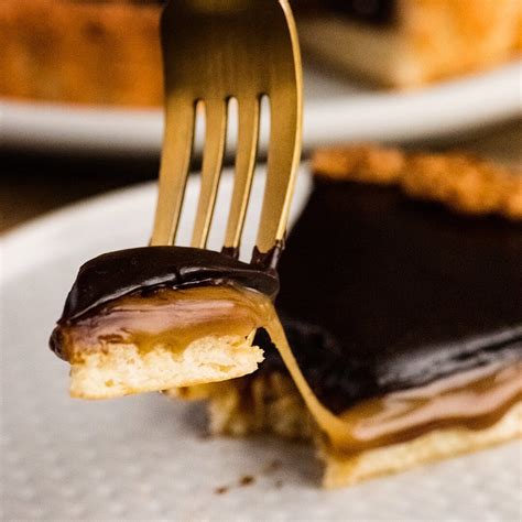 chocolate-caramel-tart-with-coconut-macaroon-crust image