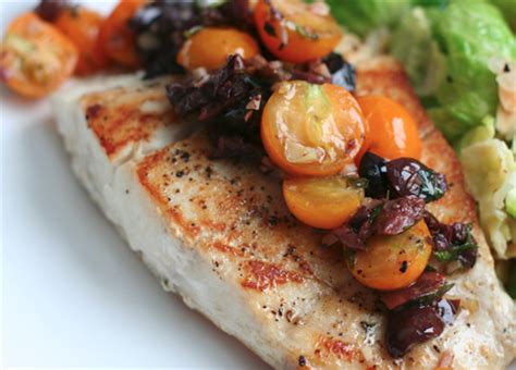 spicy-sauteed-fish-with-olives-and-cherry-tomatoes image