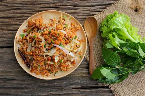 authentic-naem-khao-recipe-crispy-coconut-rice-salad image