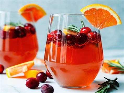 cranberry-orange-prosecco-cocktail-with-rosemary image