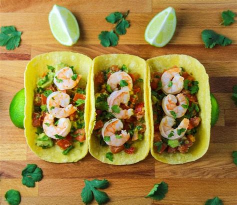 baja-shrimp-tacos-with-fiesta-avocado-salsa image