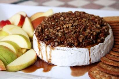 pecan-brown-sugar-and-kahlua-baked-brie-tasty-kitchen image