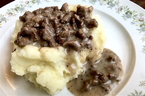 beef-gravy-over-mashed-potato-beneath-the-crust image