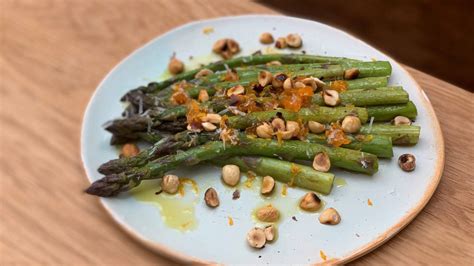 recipe-asparagus-with-cured-egg-yolk-hazelnut image