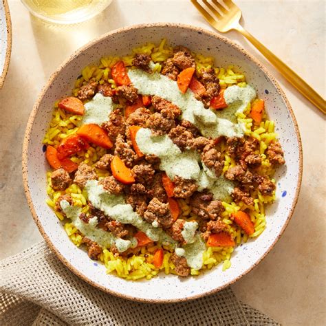 beef-curry-spiced-rice-with-creamy-cilantro-sauce image