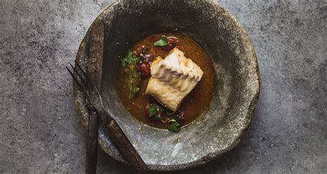 poached-cod-in-tomato-broth-recipe-bulletproof image