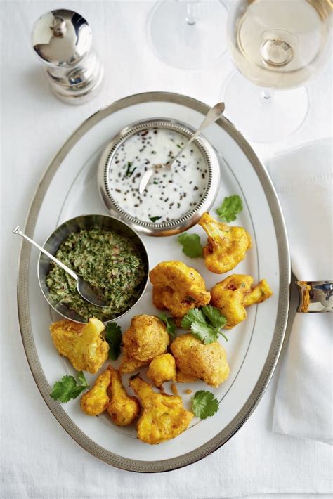 cauliflower-fritters-with-spiced-yogurt-recipe-delicious image
