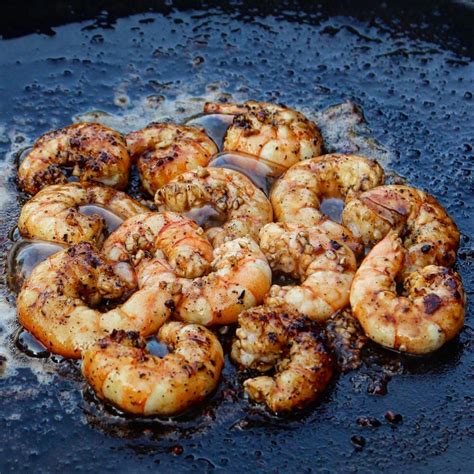 charred-garlic-butter-shrimp-over-the-fire-cooking image