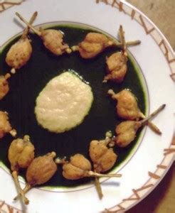 frog-legs-with-garlic-and-parsley-sauces-recipe-videos image