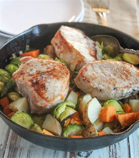 easy-oven-baked-pork-chops-with-vegetables-a-one-pan-dinner image