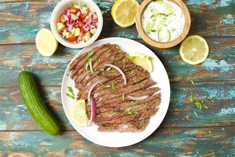 greek-marinated-flank-steak-with-tzatziki-sauce image