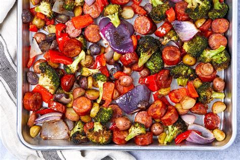 best-sheet-pan-sausage-vegetables-recipe-delish image