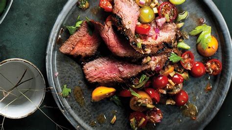 flank-steak-with-bloody-mary-tomato-salad-recipe-bon image