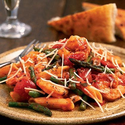 shrimp-asparagus-and-penne-pasta-recipe-myrecipes image
