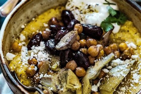 creamy-polenta-with-roasted-olives-artichokes image