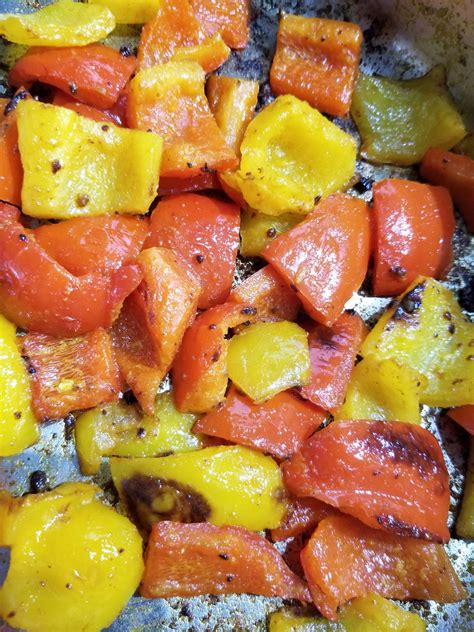 red-yellow-bell-peppers-stir-fry-on-stove-top image