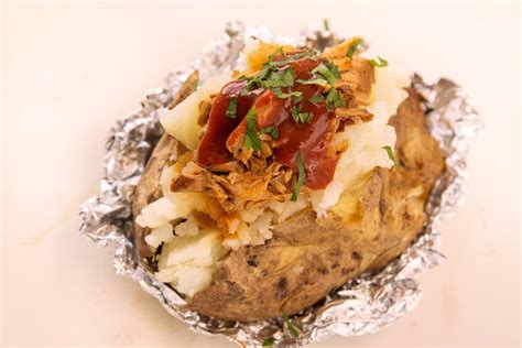 baked-potato-stuffed-with-barbecue-pulled-pork-kitchn image