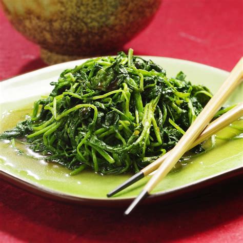 watercress-with-rice-wine-oyster-sauce-eatingwell image