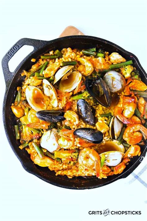 seafood-paella-with-clams-shrimp-mussels-grits image
