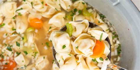 best-slow-cooker-chicken-tortellini-soup-recipe-delish image
