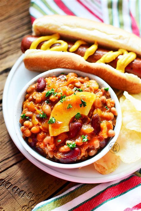 easy-slow-cooker-pineapple-baked-beans-the-salty-pot image