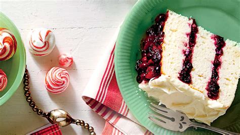 white-cake-with-cranberry-filling-and-orange image