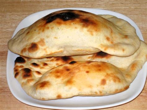 naan-oven-baked-flat-bread-indian-vegetarian image