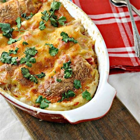easy-cheesy-white-chicken-enchiladas-loaves-and-dishes image