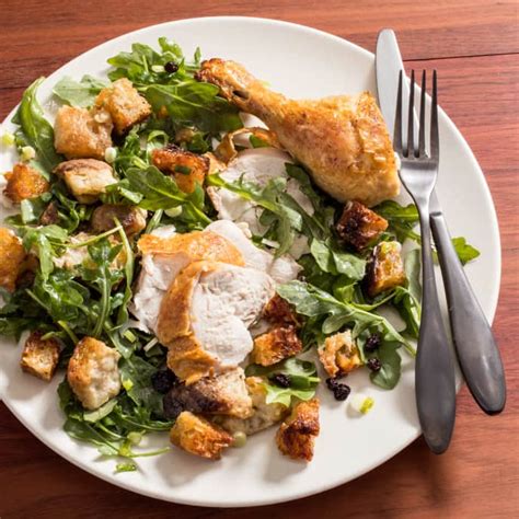 roast-chicken-with-warm-bread-salad-cooks-illustrated image