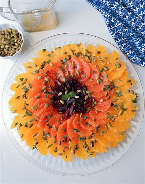 orange-and-mint-salad-with-pepitas-and-honey-lime-drizzle image