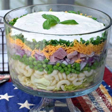 make-ahead-basil-layered-salad-recipe-for-a-crowd image