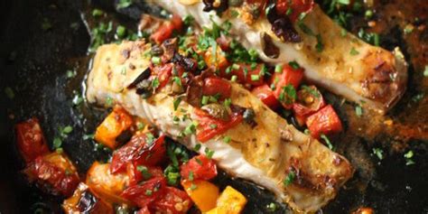 broiled-striped-bass-with-tomatoes-and-olives-meal image