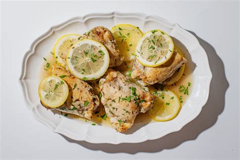 baked-lemon-chicken-with-garlic-recipe-the-spruce-eats image