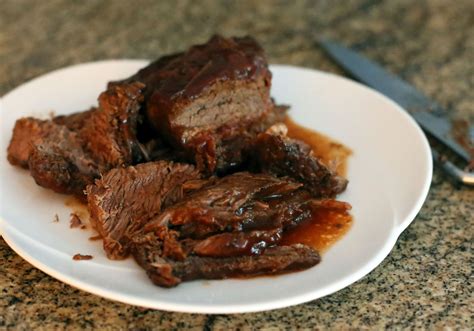 slow-cooker-beef-brisket-with-beer-recipe-the-spruce image