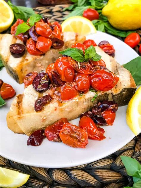 grilled-swordfish-steaks-with-tomato-olive-relish image