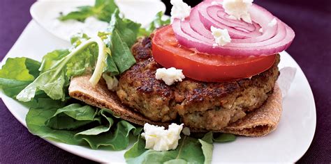 greek-burger-with-arugula-tomatoes-and-feta image