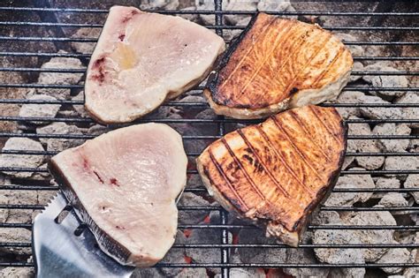 grilled-swordfish-with-lemon-herb-sauce-kitchn image