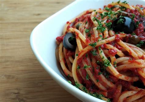 pasta-with-fresh-tomato-capers-and-olives image