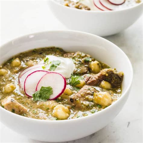 slow-cooker-tomatillo-chili-with-pork-and-hominy image