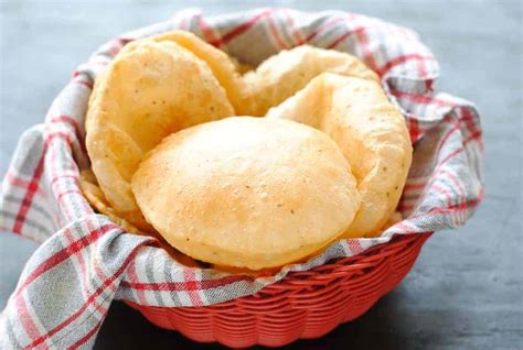 crispy-and-fluffy-puri-recipe-fried-indian-poori-bread image