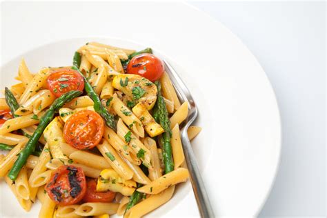 penne-pasta-with-asparagus-pancetta-and-cherry image