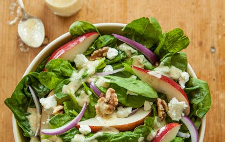 spinach-salad-with-pears-walnuts-and-goat-cheese image