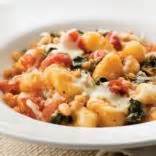skillet-gnocchi-with-swiss-chard-and-white-beans image