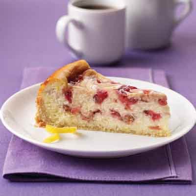 strawberry-rhubarb-ribboned-cheesecake-recipe-land image