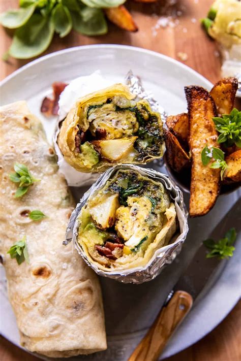 cheesy-pesto-avocado-bacon-breakfast-burrito-half image