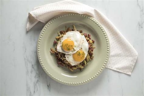 nugget-markets-corned-beef-hash-with-fried-eggs image