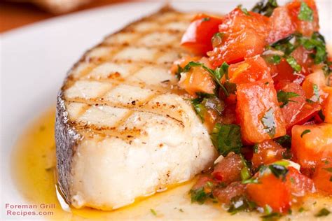grilled-halibut-with-blistered-tomatoes-and-arugula image