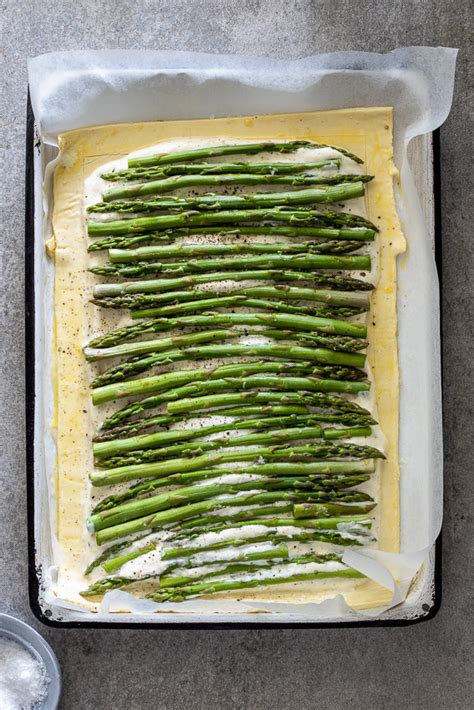 cheesy-puff-pastry-asparagus-tart-simply-delicious image